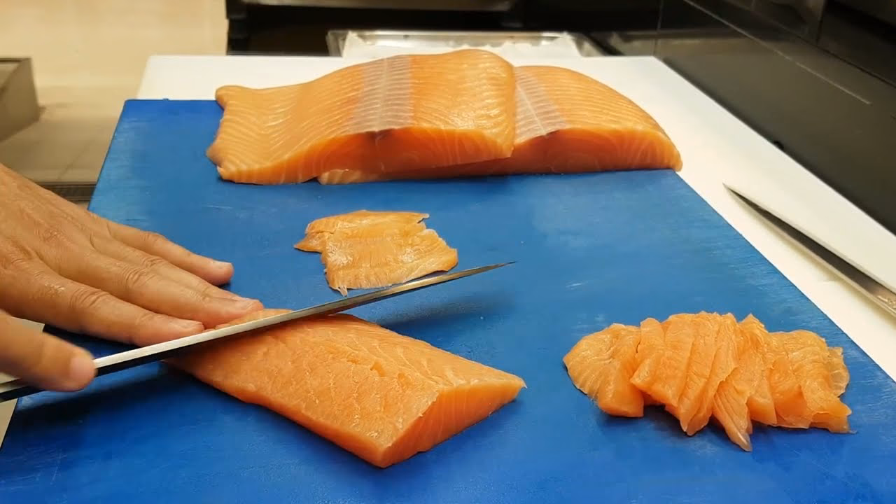 How do you cut sashimi with a knife?