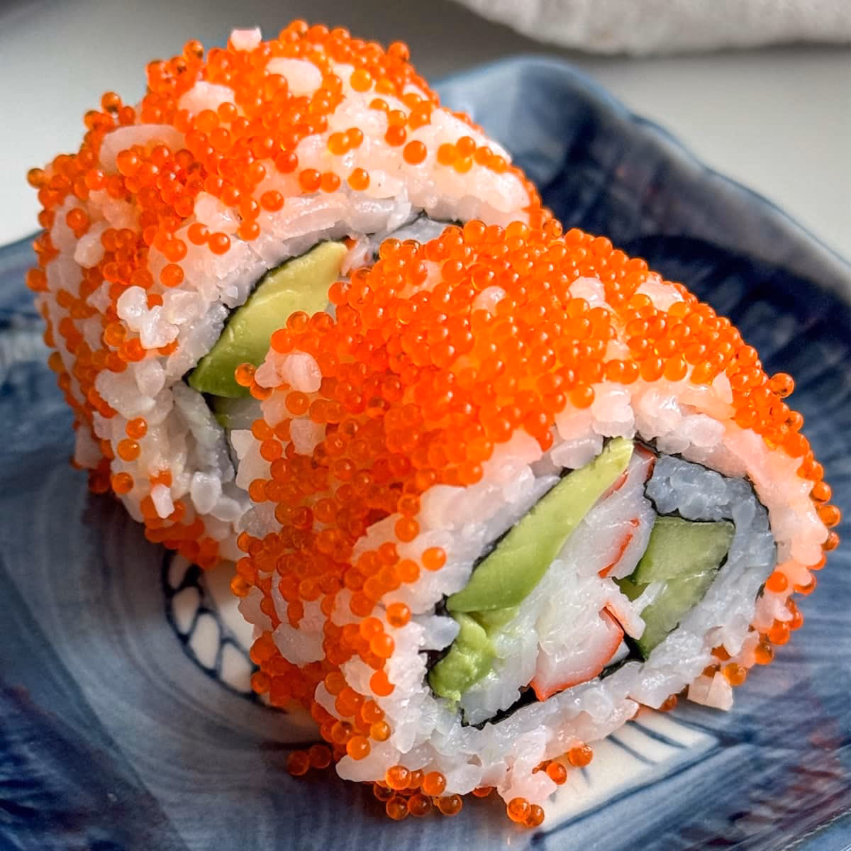 What is orange Roll & Sushi?