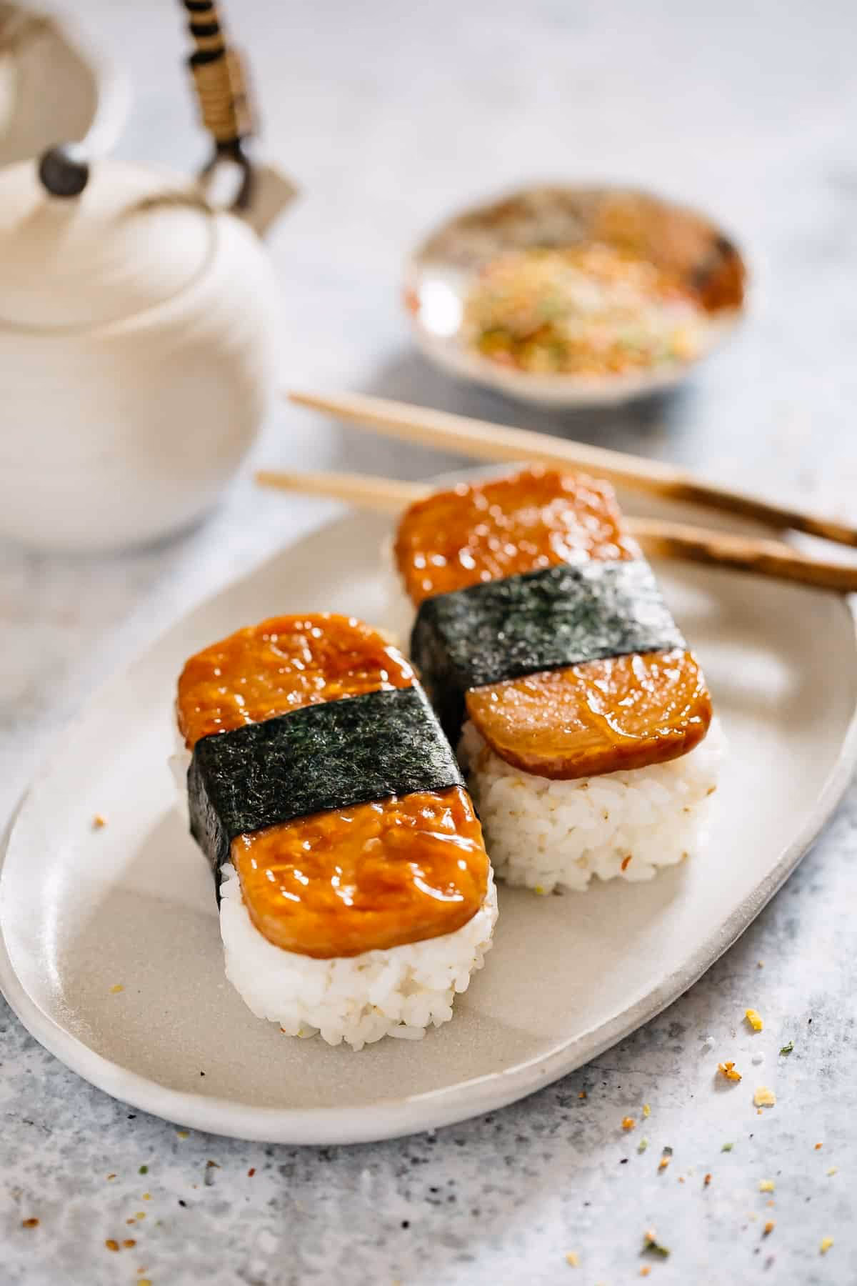 How do you eat sushi with spam?