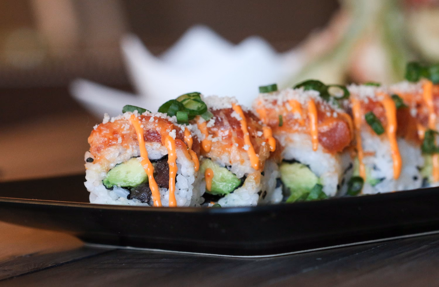 How do you make spicy tuna sushi?
